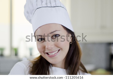 Portrait of a cute latin chef smiling