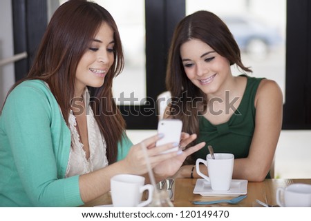 Best friends having fun and enjoying a cup of coffee