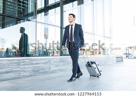 Similar – Image, Stock Photo Stylish businessman with suitcase in city