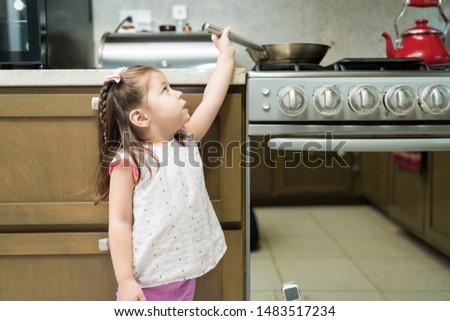 Similar – Image, Stock Photo a small child reaches for a strawberry