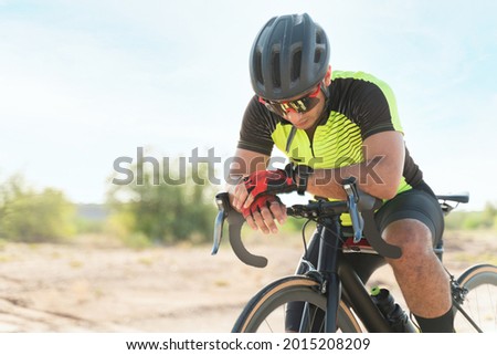 Similar – Foto Bild Junge Radfahrerin macht pause