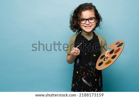 Similar – Image, Stock Photo Smiling boy in apron in kitchen