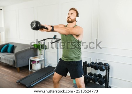 Similar – Image, Stock Photo Athletic man using his mobile phone.