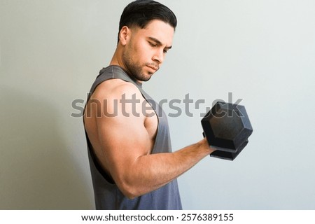 Similar – Image, Stock Photo Strong sportsman during intense training