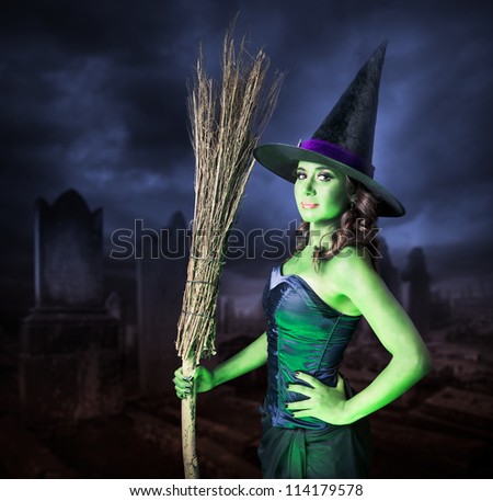 Sexy witch on a dark background