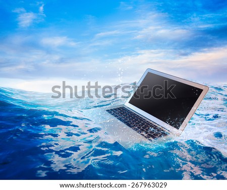 laptop on water/ damaged computer