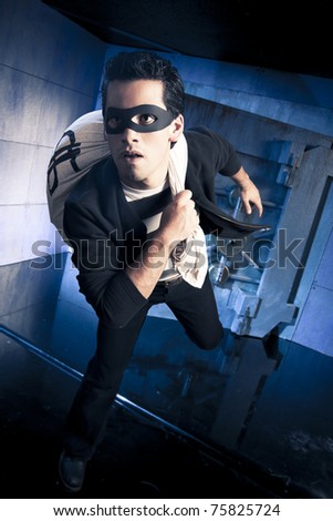 thief running out of a bank vault, low-key photo