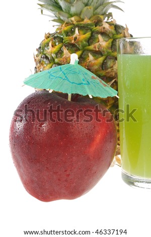 red apple and a glass of pineapple juice