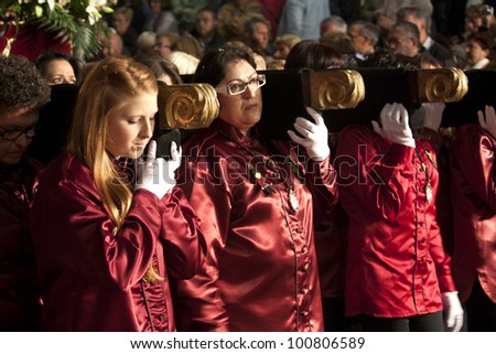 TORREVIEJA, SPAIN - APRIL, 02 : Women procession during Holy Week on April 2,2012 in Torrevieja, Spain. Tradition hundreds of years, typical in Spain.