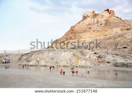 VULCANO, ITALY - SEPTEMBER 21, 2013: The small lake, located on sulfur deposits near ruins of the ancient volcano crater on Vulcano Island, Aeolian Islands in Sicily, Italy