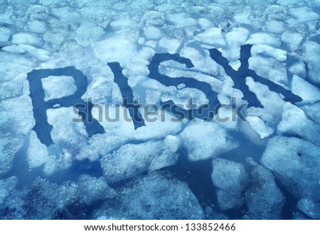Risk and danger as a thin ice concept with the word embedded in a cracked frozen lake warning any person to be very cautious as a business symbol of hazardous situation that is very dangerous.