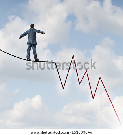 Losing Profit risk and Investment danger as a financial and business concept or metaphor facing wealth adversity as a businessman walking on a high wire tight rope shaped as a downward market graph.