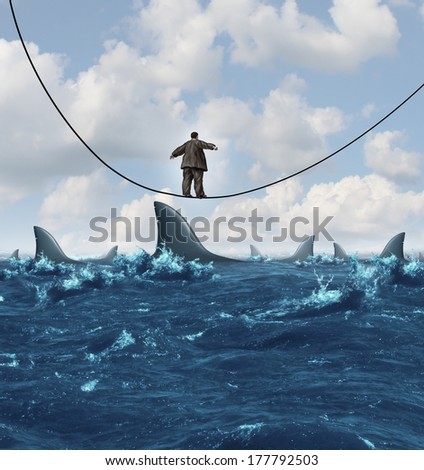 Vulnerable business as an overweight unfit businessman walking on a sinking high wire with sharks ready to attack as a metaphor for financial vulnerability in a competitive economic environment.