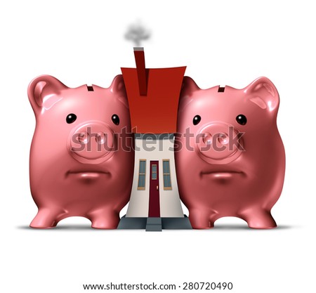 Housing crunch and home crisis concept as two piggy banks putting the squeeze on a family house as an economic symbol of feeling financial pressure and finance stress from a real estate mortgage.