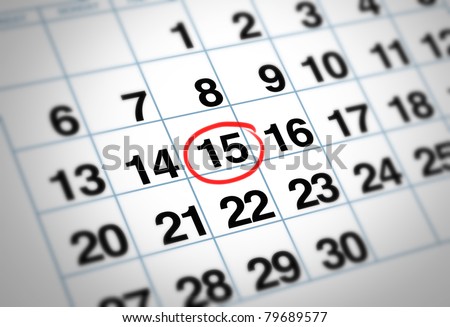Important date circled on a daily month calendar with a red mark representing planning and strategy for family and business events.