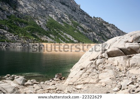 Mountain leading down to a hydro electric water dam
