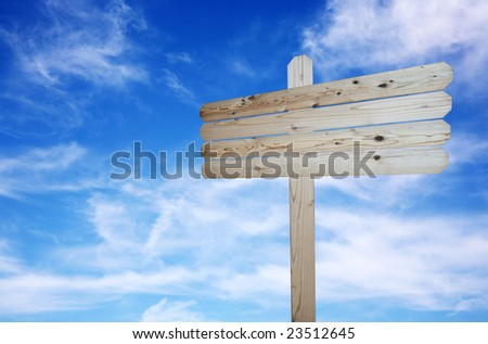 Natural wood blank sign on cloudy sky background