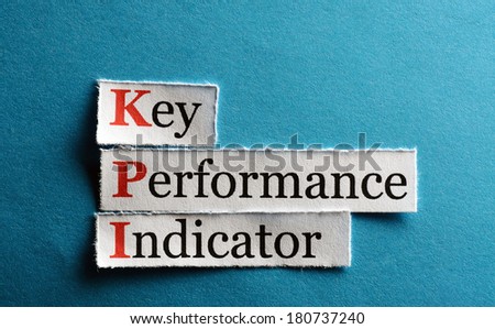 key performance indicator, KPI  on blue paper
