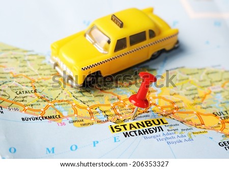 Close up of  Istanbul ,Turkey  map with red pin  and a taxi  - Travel concept