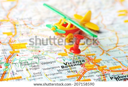 Close up of  Vicenza  , Italy map with red pin and  airplane   - Travel concept
