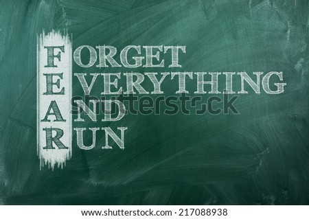 forget everything and run - FEAR acronym on green chalkboard