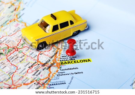 taxi car  toy on  Barcelona ,Spain  map and red pin - Travel concept