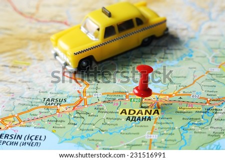 Close up of  Adana ,Turkey  map with red pin and a taxi   - Travel concept