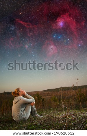 girl and a starry sky. Elements of this image furnished by NASA