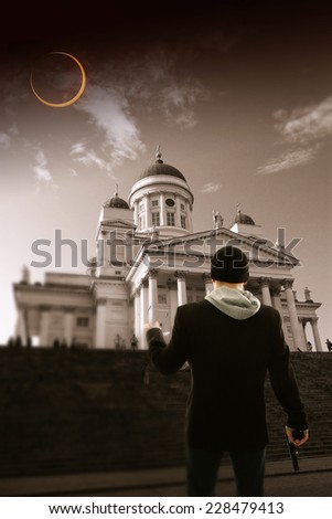 male bodyguard in the city.eclipse of the sun. picturesque and very beautiful HDR photos Helsinki. Elements of this image furnished by NASA