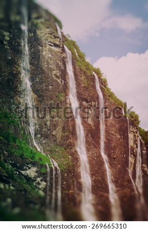 Geiranger fjord, Norway - waterfalls Seven Sisters. Photo instagram style. vintage retro