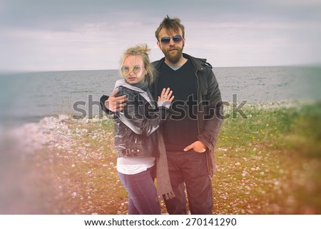 couple in love near the sea autumn. beautiful places in Europe . Photo instagram style. vintage retro.