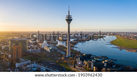 Similar – Foto Bild Blick auf die Düsseldorfer Skyline bei Sonnenuntergang