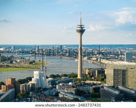 Similar – Foto Bild Blick auf die Düsseldorfer Skyline bei Sonnenuntergang