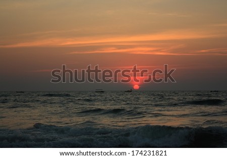 Bright and beautiful sunset on Goa beach.