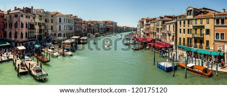 ITALY, VENICE - JULY 16 - A lot of traffic on the Grand Canal on July 16, 2012 in Venice. More than 20 million tourists come to Venice annually.