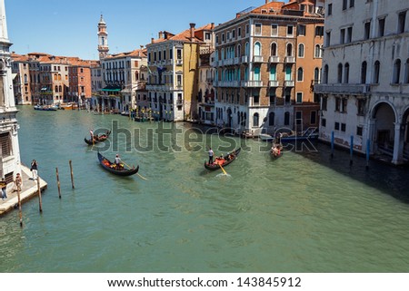 ITALY, VENICE - JULY 16 - A lot of traffic on the Grand Canal on July 16, 2012 in Venice. More than 20 million tourists come to Venice annually.