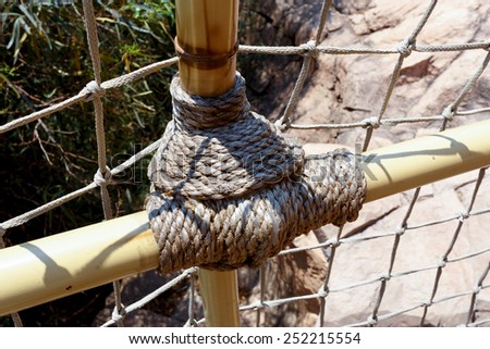 detail of suspension rope bridge in Sun City South Africa, entry to maze, one of tourist atraction in luxury resort
