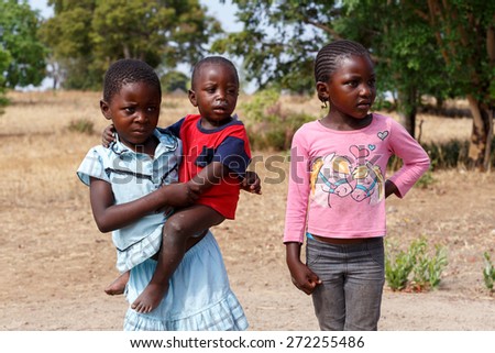 NAMIBIA, KAVANGO, OCTOBER 15: Unidentified dirty and poor Namibiann childrens near town Rundu. Kavango is region with the highest poverty level in Namibia. October 15, 2014, Namibia