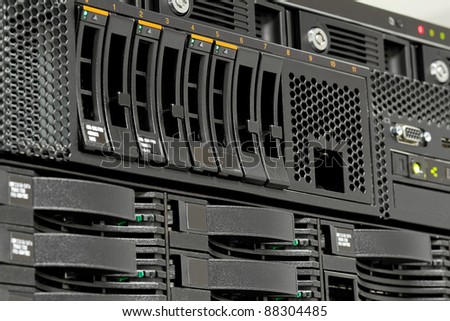servers stack with hard drives in a datacenter