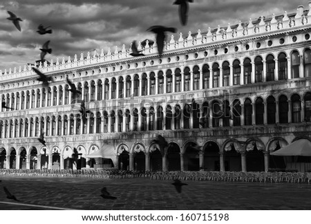 Deserted cafe in Piazza San Marco, Venice (Dramatic black-and-white photo)