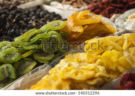 A display of dried fruits including kiwis, ginger and other delicacies at a fruit stand near the Great Wall of China at Mutianyu.