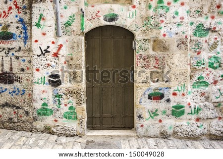 In the Old City of Jerusalem, many doorways of Arab families show where they have made religious pilgrimages to Islamic sites through paintings on the walls near the door.