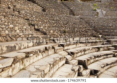 Rows of marble stone seats rise up in the ancient Greek theater at Ephesus in Turkey. There are two theaters in Ephesus and this is the small theatre.