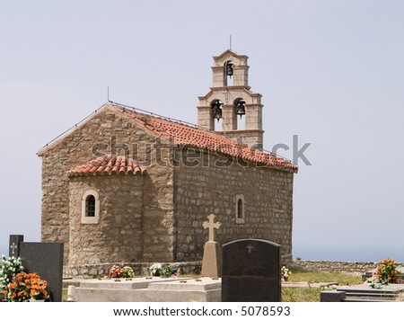 A small community hill church near the town of Vrba on the Montenegro coast. The stone church is built of stone and is partially surrounded by a small cemetery.