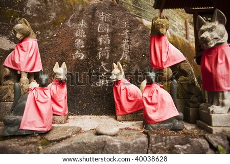 Stone Foxes (Kitsune), Dressed With Red Capes, Act As Guardians To ...