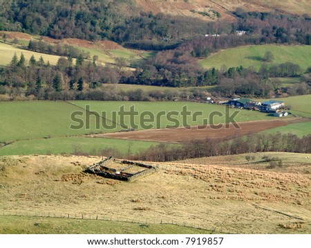 Farm in the Strathendrick valley with an old sheepfold in foreground