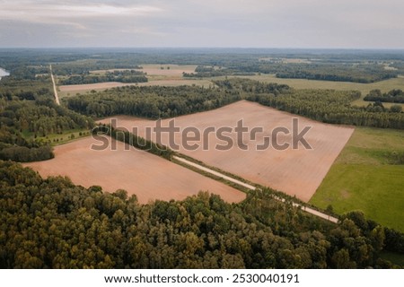 Similar – Image, Stock Photo Road running through dense forest