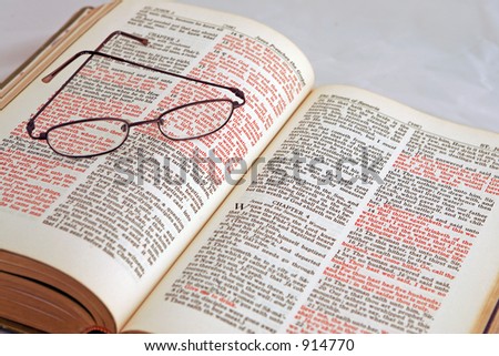 Open Bible and glasses