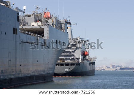 Cargo ships at dock.