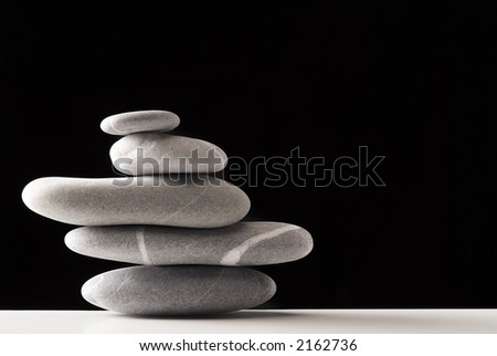 stones pile over black